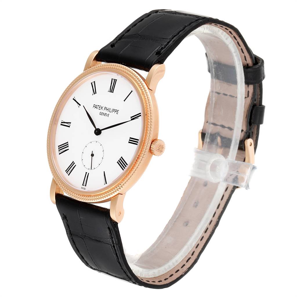 The image shows a side-front angled view of the Patek Philippe Calatrava 5119R Men's Rose Gold White Dial 5119R Men's Rose Gold White Dial watch, featuring its face, strap, and crown.