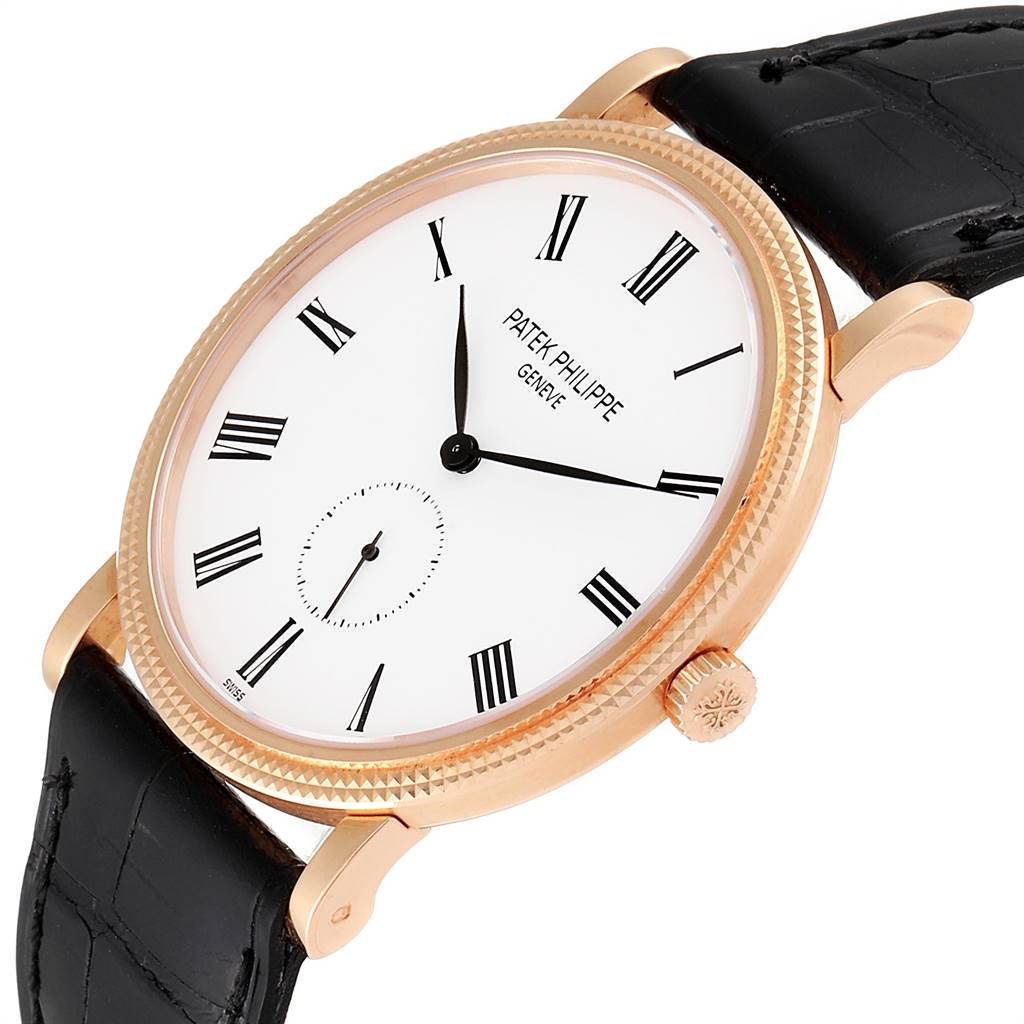 The image shows a Patek Philippe Calatrava 5119R Men's Rose Gold White Dial 5119R Men's Rose Gold White Dial watch from an oblique angle, highlighting the face, case, crown, and leather strap.