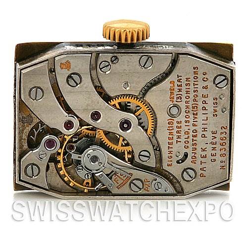 The image shows the inner mechanism (movement) of a Vintage Patek Philippe watch from a top-down angle.