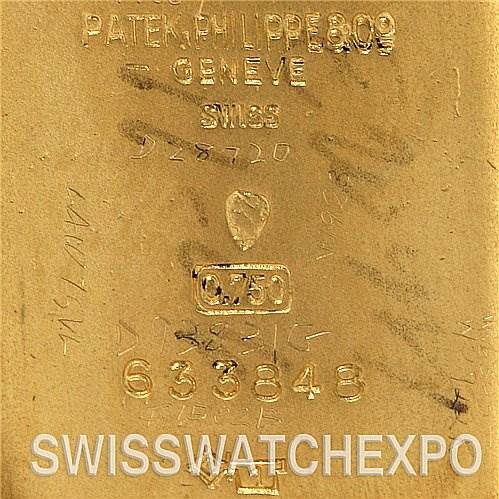 The image shows the back case of a Vintage Patek Philippe watch with model number 809 and other engraved details.