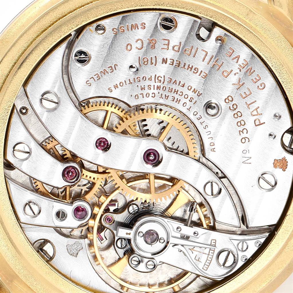 This image shows the intricate movement mechanism of a Vintage Patek Philippe watch from a rear angle.