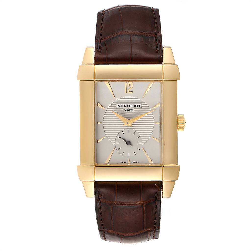 The image shows a frontal view of the Patek Philippe Gondolo 51111J Men's Yellow Gold Silver Dial 51111J Men's Yellow Gold Silver Dial watch, highlighting its rectangular dial and brown leather strap.