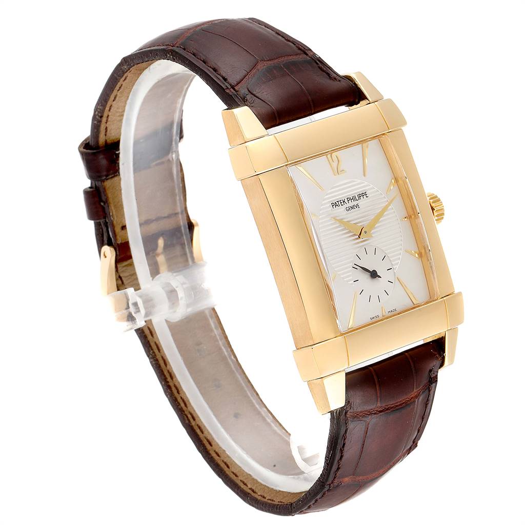 The image shows a Patek Philippe Gondolo 51111J Men's Yellow Gold Silver Dial 51111J Men's Yellow Gold Silver Dial watch angled from the front-left, highlighting its gold case and brown leather strap.