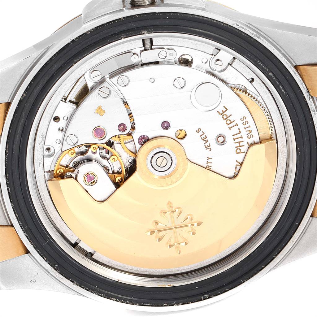 The image shows the back view of the Patek Philippe Neptune 5080/IJA Men's Steel and Gold (two tone) Black Dial 5080/IJA Men's Steel and Gold (two tone) Black Dial model, displaying its intricate movement and internal components.