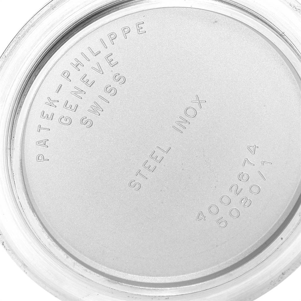 This image shows the back case of a Patek Philippe Neptune 5080/IJA Men's Steel and Gold (two tone) Black Dial 5080/IJA Men's Steel and Gold (two tone) Black Dial model watch, displaying engravings that include the brand's name.