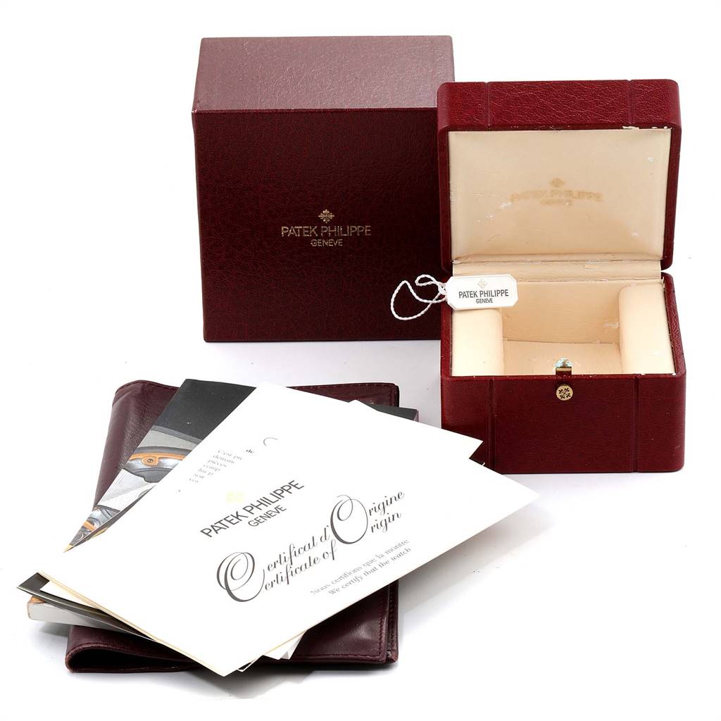 The image shows the packaging, certificate, and manual for the Patek Philippe Neptune 5080/IJA Men's Steel and Gold (two tone) Black Dial 5080/IJA Men's Steel and Gold (two tone) Black Dial model watch.