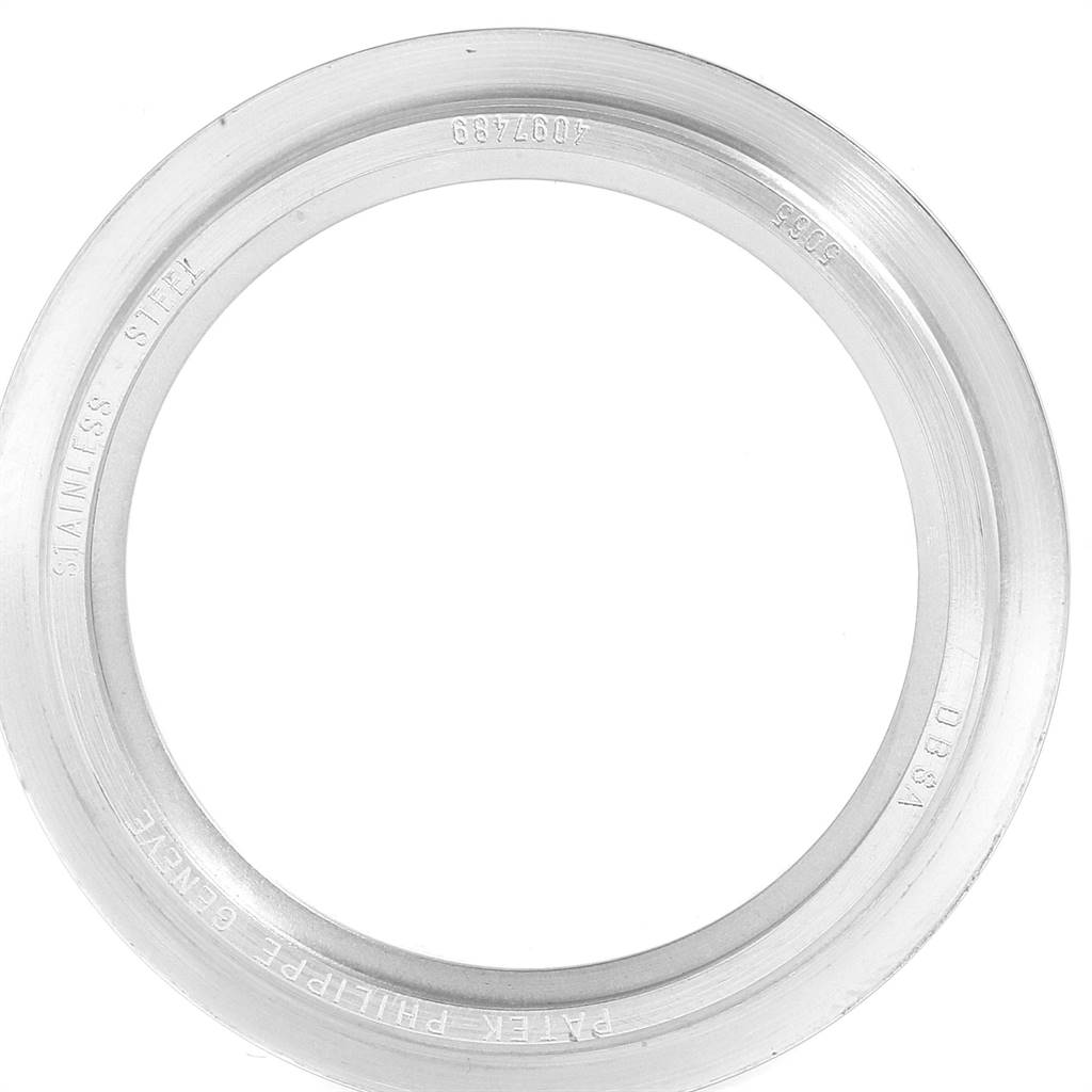 This image shows a stainless steel bezel for a Patek Philippe Aquanaut 5065/1A-010 Men's Stainless Steel Black Dial 5065/1A-010 Men's Stainless Steel Black Dial watch, viewed from the front.