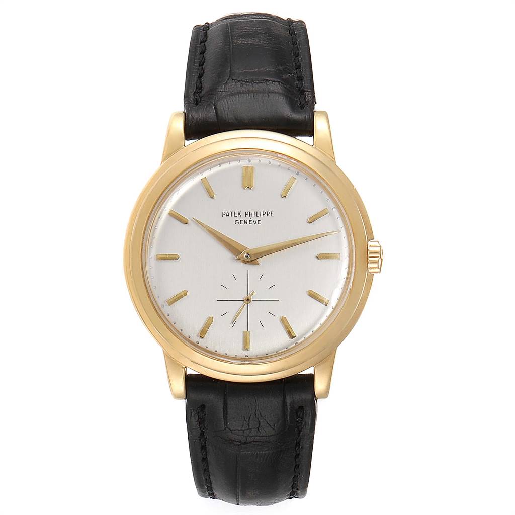 The image shows a front view of a Vintage Patek Philippe watch with a gold case and a black leather strap.