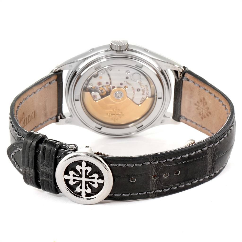 The image shows the backside and strap of a Patek Philippe Complications 5056P Men's White Gold Grey Dial 5056P Men's White Gold Grey Dial watch, highlighting the exposed movement and clasp.
