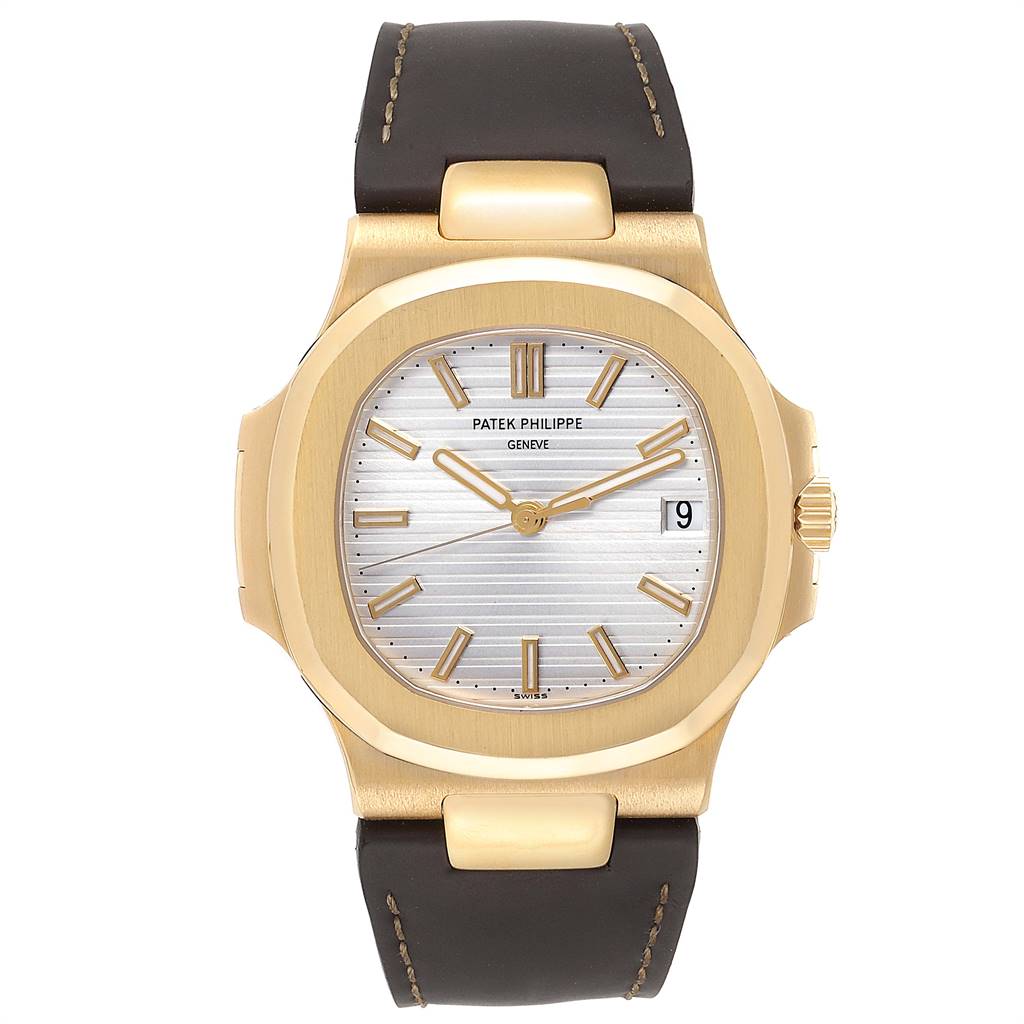 The image shows a Patek Philippe Nautilus 5711J Men's Yellow Gold Silver Dial 5711J Men's Yellow Gold Silver Dial watch from a front angle, displaying the dial, case, and leather strap.