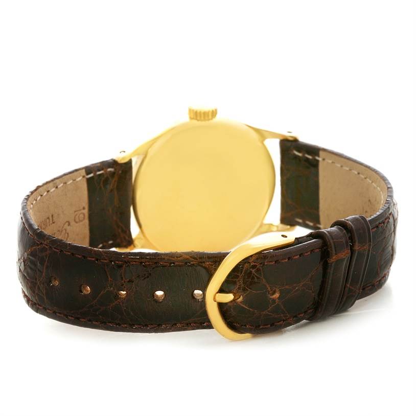 The image shows the back case and buckle of a Vintage Patek Philippe watch from a rear angle.