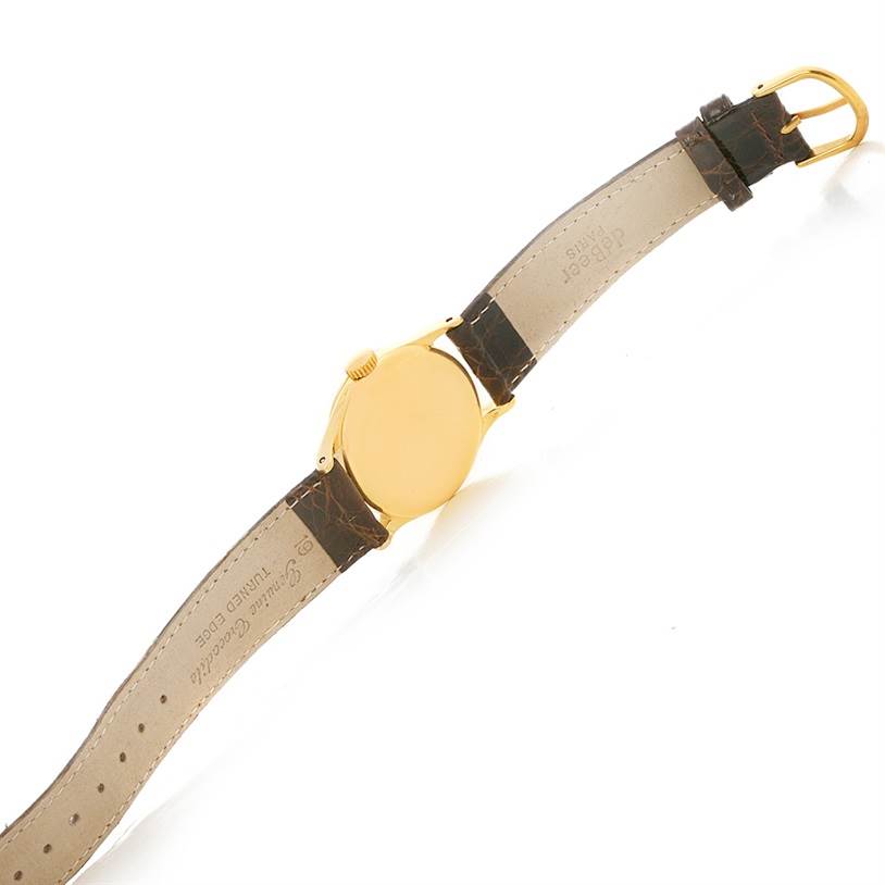 This image shows the back and strap of a Vintage Patek Philippe watch from a top view.