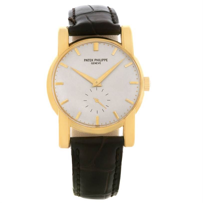 The image shows a front view of a Vintage Patek Philippe watch with a gold case and black leather strap.