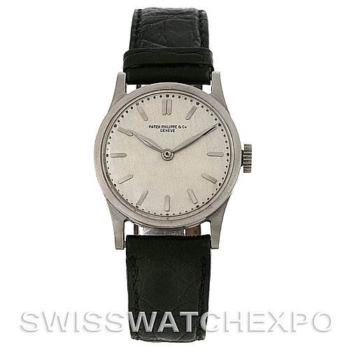 The image shows a front view of a Vintage Patek Philippe watch highlighting the dial, hands, and black leather strap.