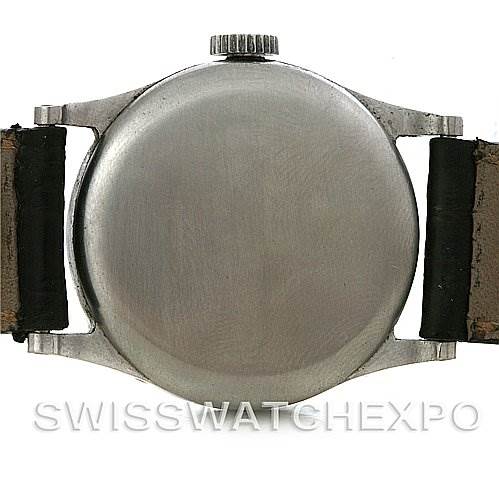 This is the back view of a Vintage Patek Philippe watch, showing the case back, lugs, and partial leather straps.