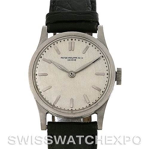 This image shows a frontal view of a Vintage Patek Philippe watch, featuring the dial, hands, crown, and black leather strap.