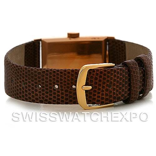 This image shows the brown leather strap and gold buckle of a Vintage Patek Philippe watch from the rear angle.