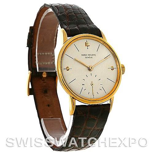 The image shows a front and side angle of a vintage Patek Philippe watch with a gold case and brown leather strap.