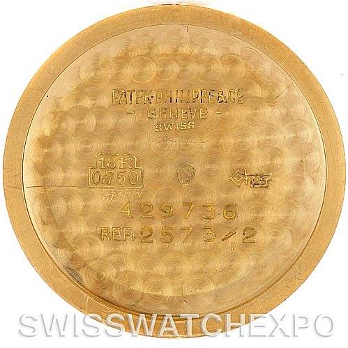 This image shows the interior case back of a Vintage Patek Philippe model, reference number 2573/2, stamped with various markings and specifications.