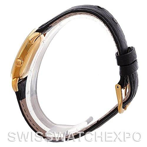 The image shows a side view of a Vintage Patek Philippe watch, highlighting its case, crown, and leather strap.