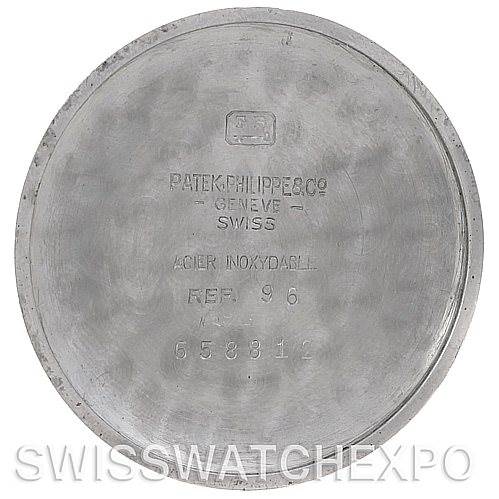 The image shows the inner case back of a Vintage Patek Philippe watch, featuring the brand's hallmark and model details.