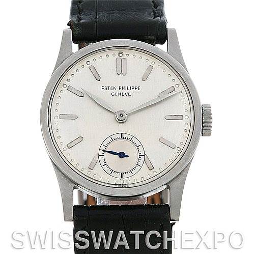 This image shows a front view of a Vintage Patek Philippe watch, displaying its dial, hands, markers, case, and part of the leather strap.