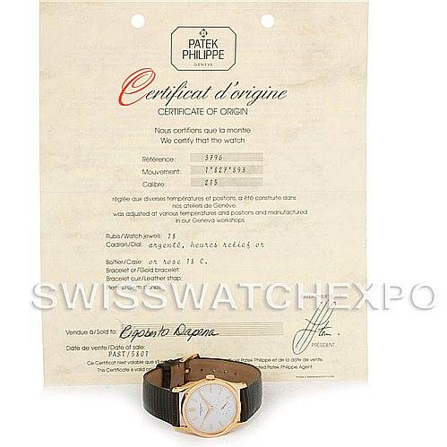 The image shows a Patek Philippe Vintage watch and its certificate of origin, focusing on the watch's face and band.