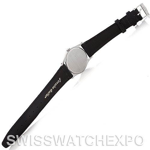 This image shows the back view of a Vintage Patek Philippe watch with a black strap.