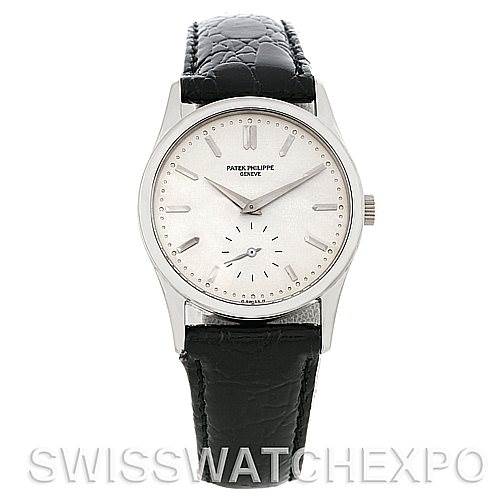 This image shows a front view of a Vintage Patek Philippe watch, featuring a black leather strap and a silver dial.