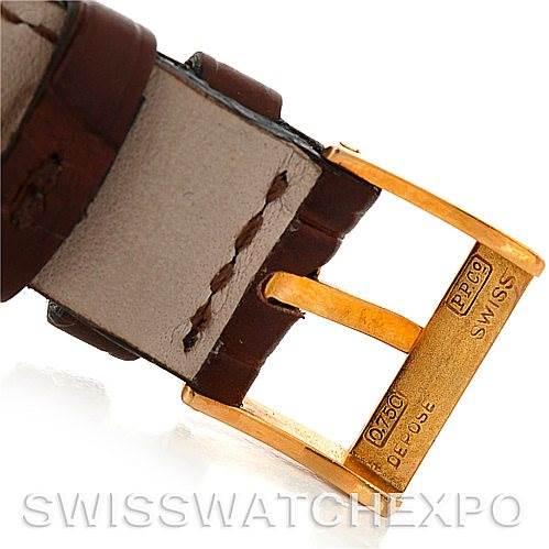The image shows the buckle and leather strap of a Vintage Patek Philippe watch, viewed up close from an angled side perspective.