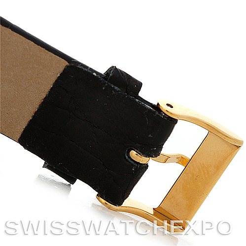 The image shows a close-up of the gold buckle and part of the leather strap of a Vintage Patek Philippe watch.