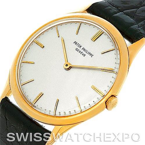 The image shows a Patek Philippe Vintage 2588 Men's Yellow Gold Silver Dial 2588 Men's Yellow Gold Silver Dial model watch at an angled view, highlighting the dial, case, crown, and leather band.