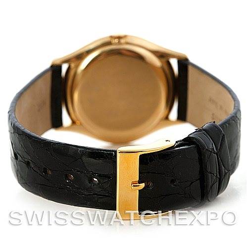 The image shows the back and clasp of a Vintage Patek Philippe watch with a black leather strap.