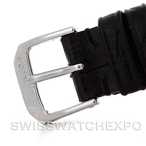 The image shows a close-up of the black leather strap and metal buckle of a Vintage Patek Philippe watch.