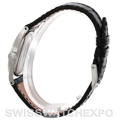 This image shows a side view of the Patek Philippe Vintage Men's Stainless Steel Silver Dial Men's Stainless Steel Silver Dial watch, highlighting the crown, case, and leather strap.