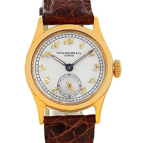 Front view of a Vintage Patek Philippe watch showing the dial, hands, sub-dial, and leather strap.