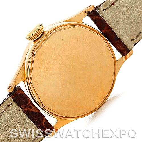 The image shows the back case and straps of a vintage Patek Philippe watch, viewed from the rear angle.