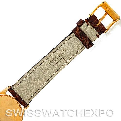 This image shows the back view of the leather strap and gold buckle of a Vintage Patek Philippe watch.