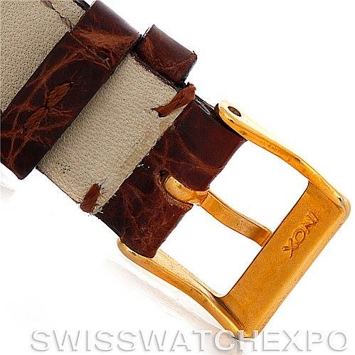 The image shows a close-up of a leather strap and gold buckle for a Vintage Patek Philippe watch.