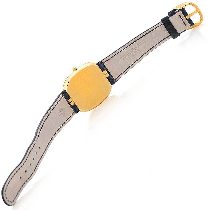 This image shows the back and strap of a Patek Philippe Golden Ellipse 3738 Men's Yellow Gold Blue Dial 3738 Men's Yellow Gold Blue Dial watch, displayed at an angle.