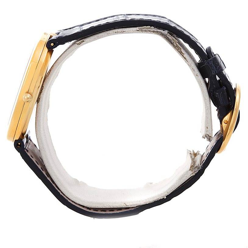 This image shows a side view of the Patek Philippe Golden Ellipse 3738 Men's Yellow Gold Blue Dial 3738 Men's Yellow Gold Blue Dial watch, highlighting its case and strap.