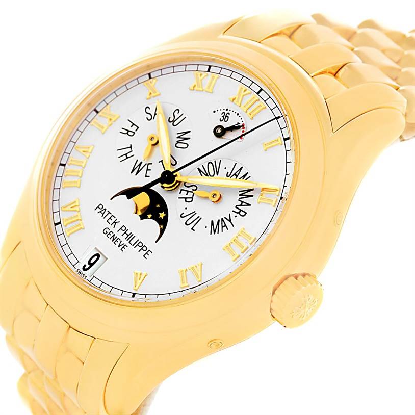 The image shows a close-up of the face and part of the band of the Annual Calendar Moonphase 18K Yellow Gold Patek Philippe 5036 Men's Yellow Gold White Dial 5036 Men's Yellow Gold White Dial 5036 watch.