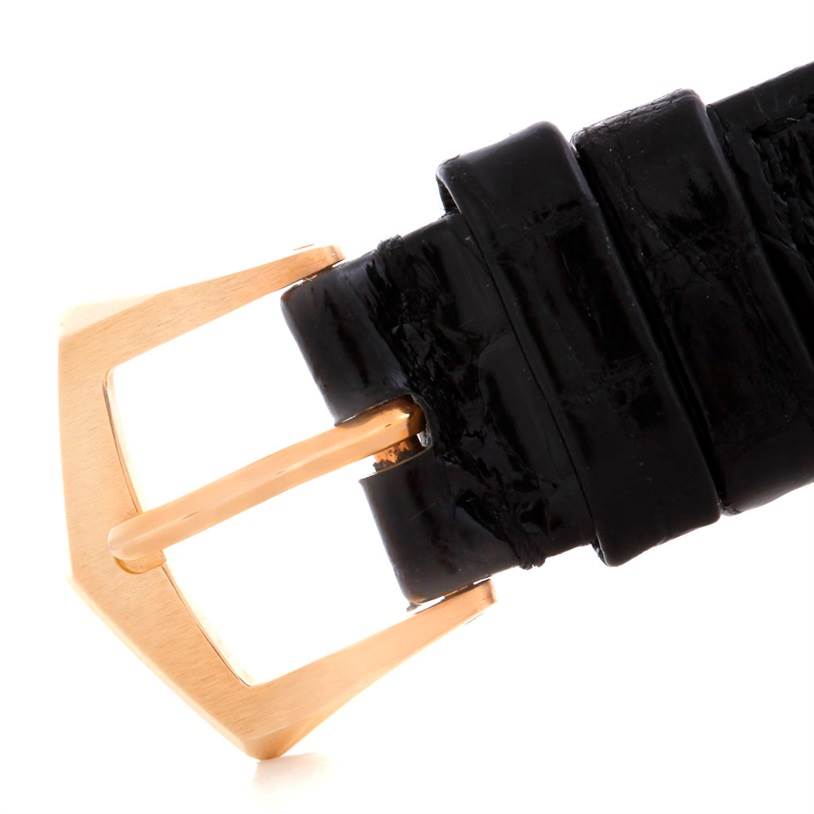 This image shows the clasp and part of the black leather strap of the Patek Philippe Calatrava 3796 Men's Rose Gold Pink Dial 3796 Men's Rose Gold Pink Dial model watch.