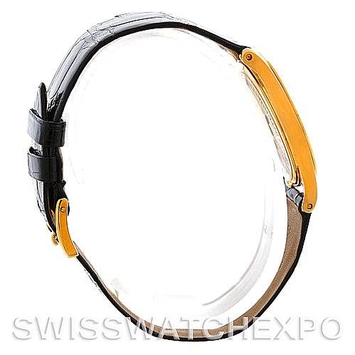 The image shows a side view of the Patek Philippe Calatrava 3796 Men's Yellow Gold White Dial 3796 Men's Yellow Gold White Dial watch, highlighting its black leather strap and gold case.