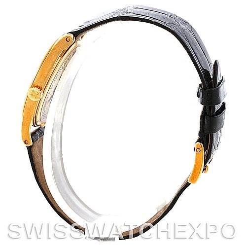 The image shows a side profile view of the Patek Philippe Calatrava 3796 Men's Yellow Gold White Dial 3796 Men's Yellow Gold White Dial watch, highlighting its case, crown, and leather strap.