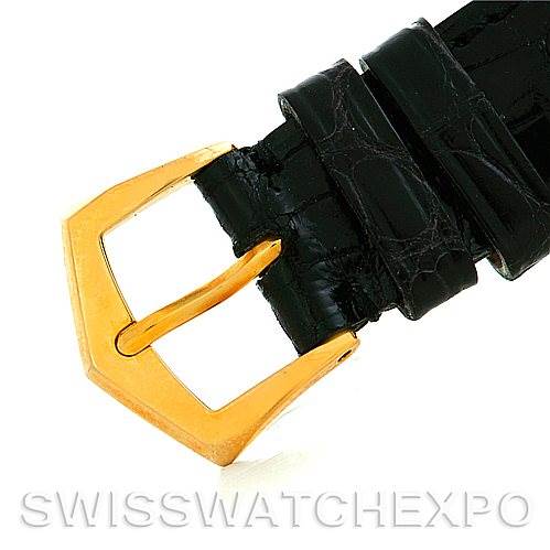 The image shows a close-up of the black leather strap and gold buckle of a Patek Philippe Calatrava 3802 Men's Yellow Gold White Dial 3802 Men's Yellow Gold White Dial watch.