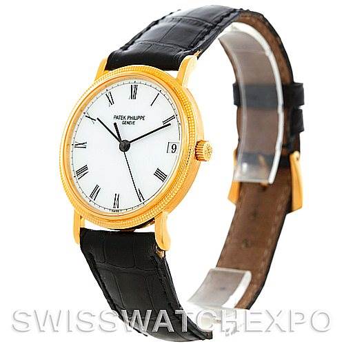 This image shows a Patek Philippe Calatrava 3802 Men's Yellow Gold White Dial 3802 Men's Yellow Gold White Dial watch at a three-quarter angle, displaying its white dial, gold case, date window, and black leather strap.