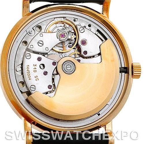 This image shows the back view of a Patek Philippe Calatrava 3802 Men's Yellow Gold White Dial 3802 Men's Yellow Gold White Dial model, displaying its intricate movement and winding rotor.