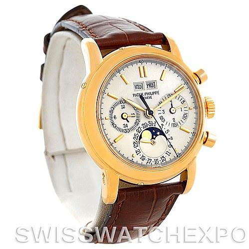 This image shows a side angle of the Patek Philippe 3970 Men's Yellow Gold Silver Dial 3970 Men's Yellow Gold Silver Dial 3970 18K Yellow Gold Perpetual Calendar Chronograph watch with a brown leather strap.