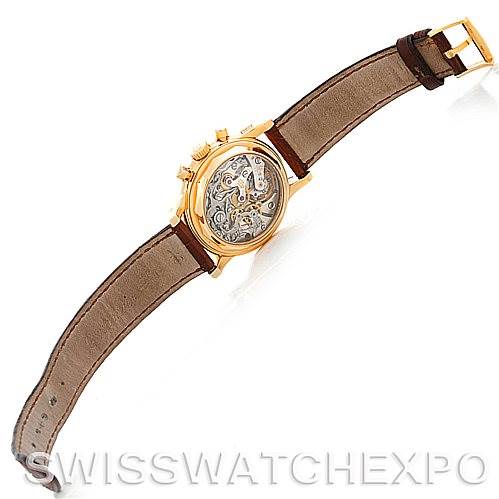 The image shows the back view of the Patek Philippe 3970 Men's Yellow Gold Silver Dial 3970 Men's Yellow Gold Silver Dial 18K Yellow Gold Perpetual Calendar Chronograph Watch 3970, fully displaying its intricate movement.